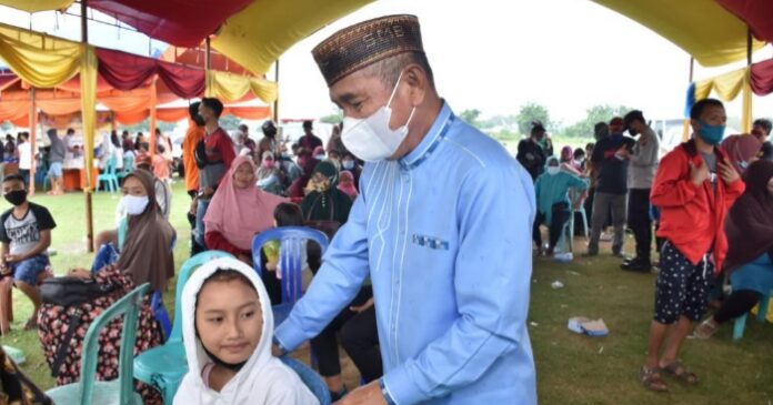 Bupati Saipul Berpesan Anak Sekolah Ajak Saudara dan Kerabatnya Ikut Vaksinasi